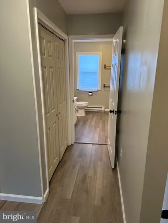 a bathroom with a toilet a sink and bath tub