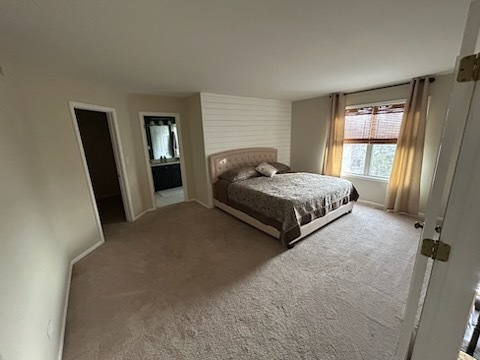 29 Ivanhoe Lane Cary, IL 60013 - Photo 17 of 36 a bedroom with double bed and window