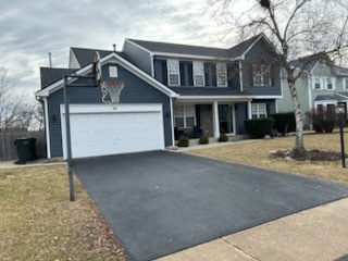 29 Ivanhoe Lane Cary, IL 60013 - Photo 2 of 36 a front view of a house with a outdoor space