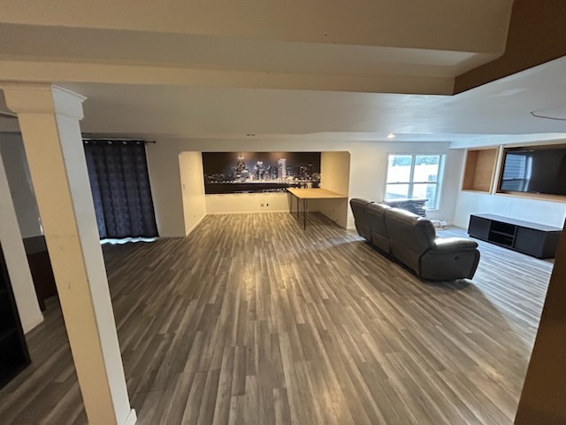 29 Ivanhoe Lane Cary, IL 60013 - Photo 29 of 36 a living room with furniture and a wooden floor
