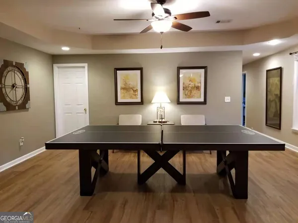 a view of a workspace with furniture