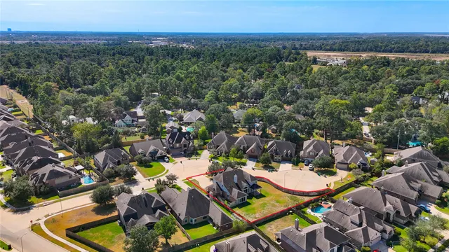 an aerial view of a swimming pool patio and mountain view