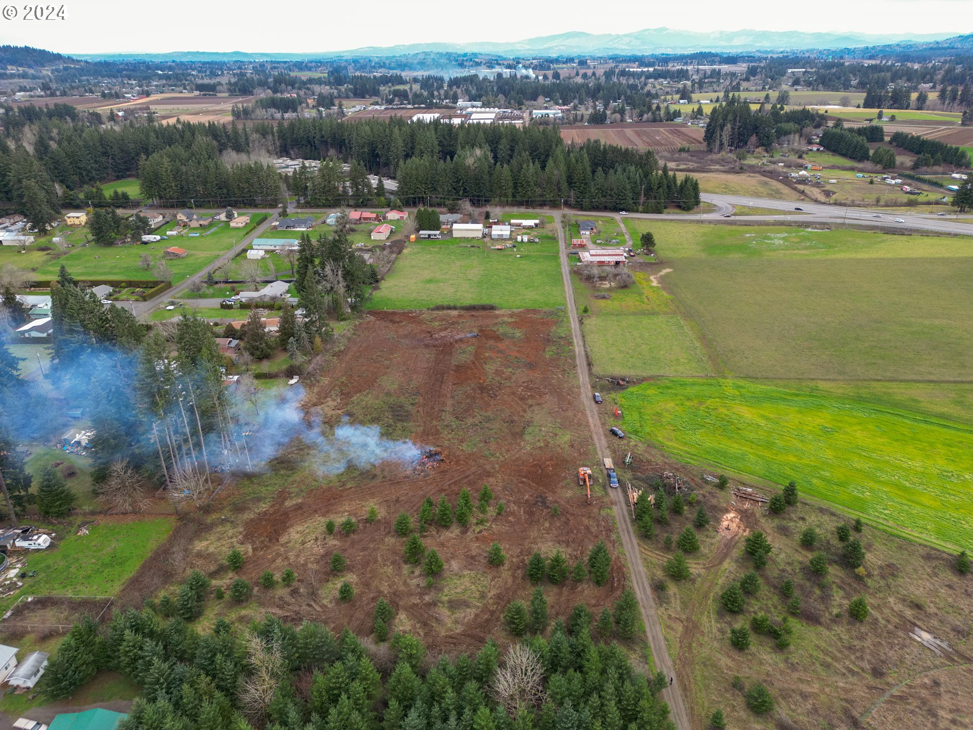 33166 Southeast Kelso Road Boring, OR 97009 - Photo 18 of 20 an aerial view of a house with a yard lake view and mountain view