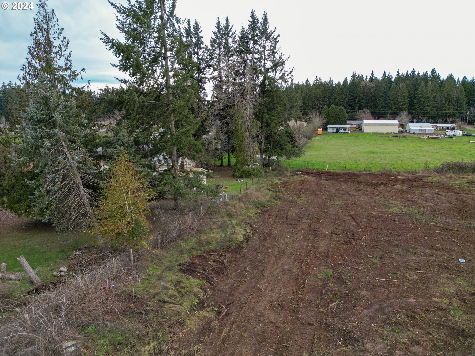33166 Southeast Kelso Road Boring, OR 97009 - Photo 5 of 20 a view of a field with trees