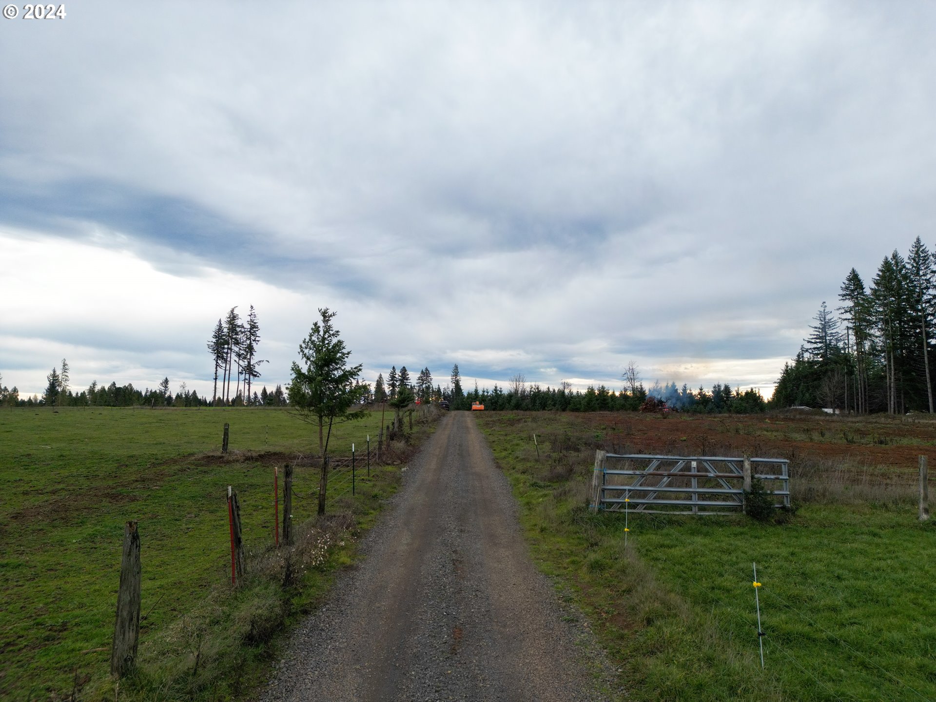 33166 Southeast Kelso Road Boring, OR 97009 - Photo 7 of 20 a view of a lake with a big yard