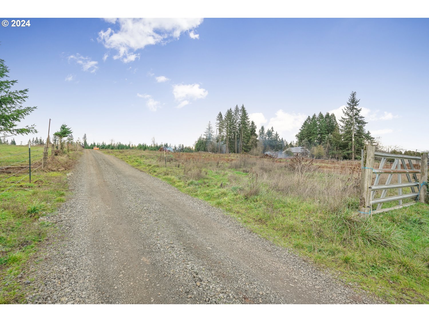 33166 Southeast Kelso Road Boring, OR 97009 - Photo 8 of 20 a view of a lake with a yard