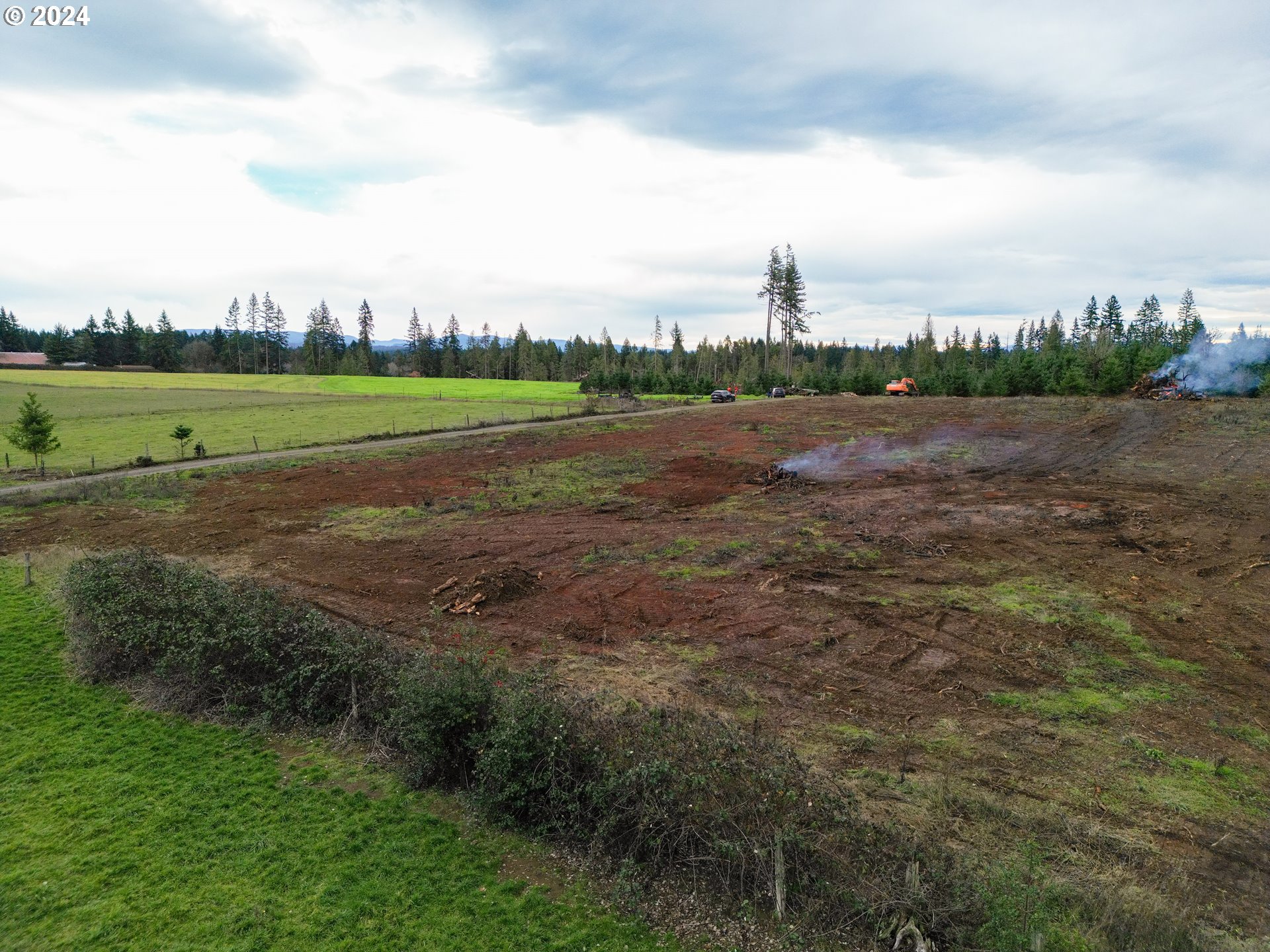 33166 Southeast Kelso Road Boring, OR 97009 - Photo 9 of 20 a view of a golf course with a lake