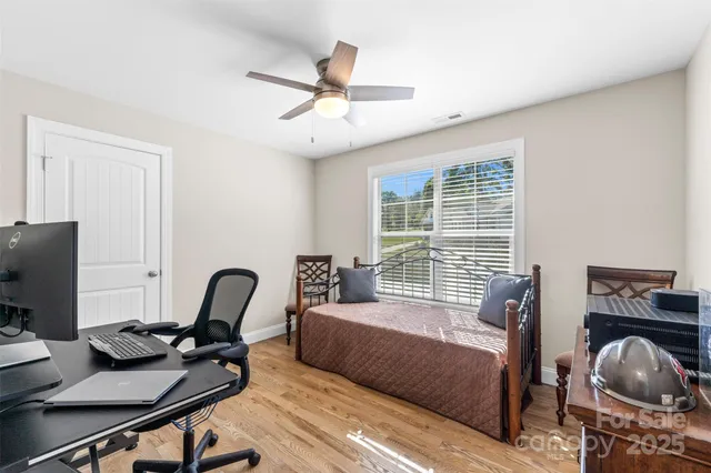 a view of a workspace with furniture