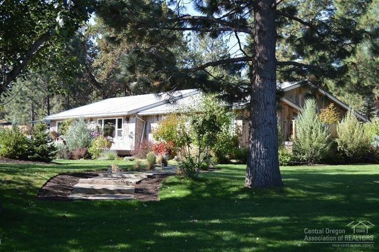 60401 Hanes Road Bend, OR 97702 - Photo 2 of 25 Tall pines shade the grounds. No detail