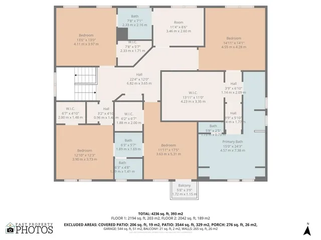 a living room with lots of furniture and a large window