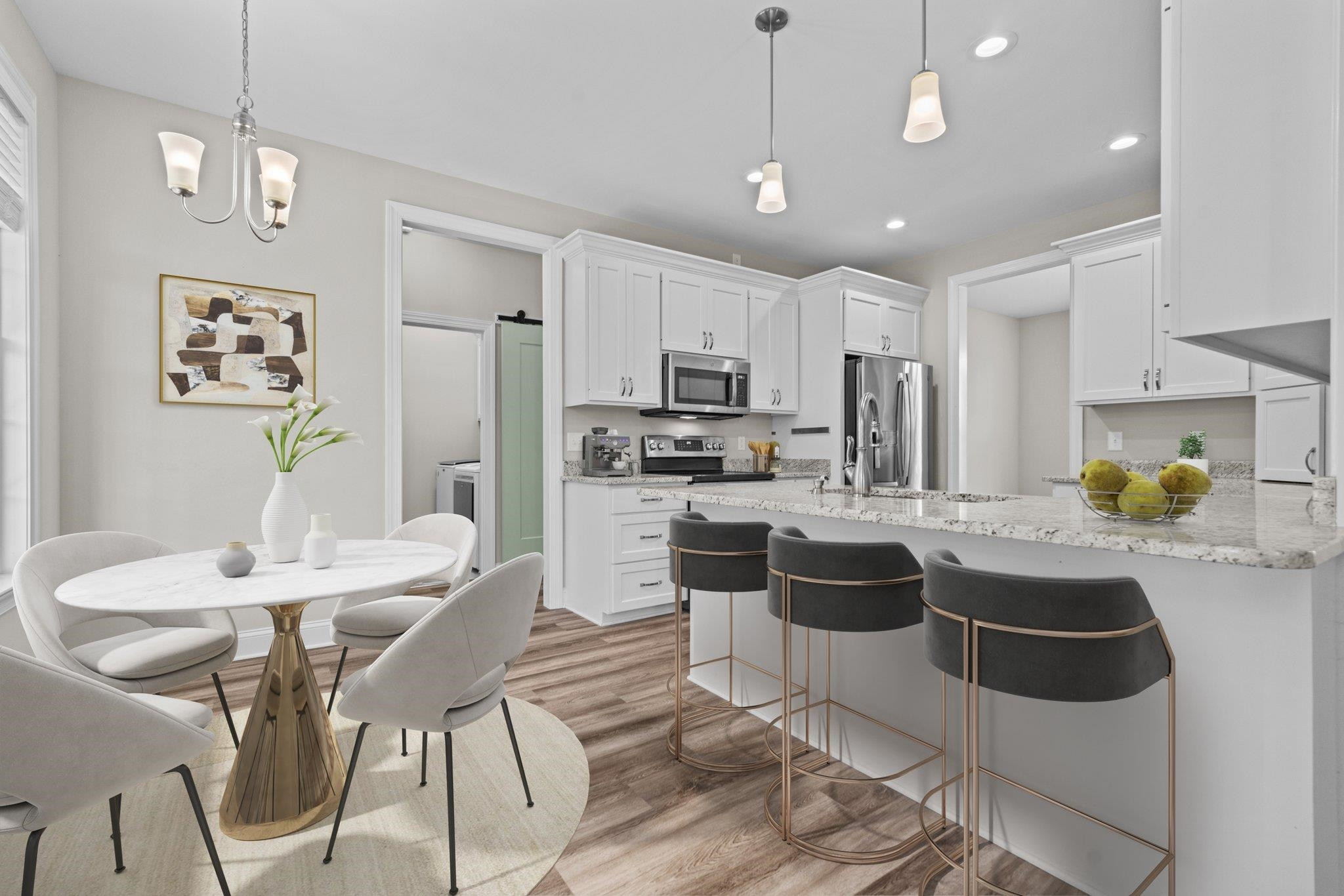991 Sheriff Johnson Road Lillington, NC 27546 - Photo 11 of 52 a kitchen with stainless steel appliances kitchen island granite countertop a sink and a refrigerator