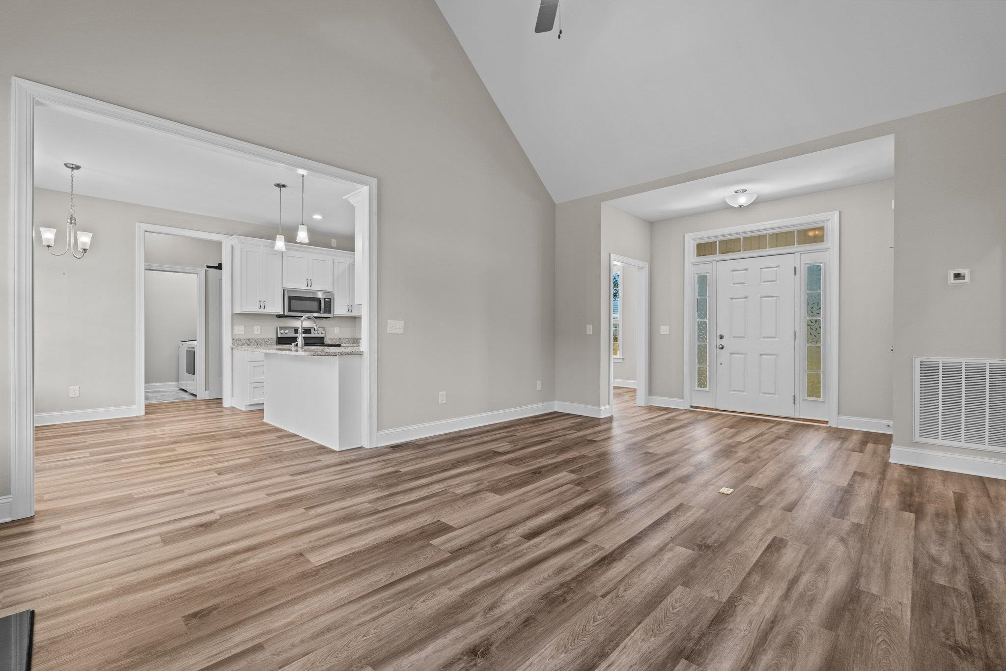991 Sheriff Johnson Road Lillington, NC 27546 - Photo 16 of 52 a view of a livingroom with wooden floor