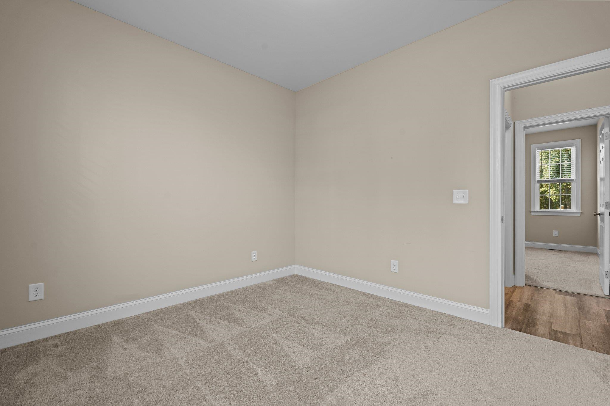 991 Sheriff Johnson Road Lillington, NC 27546 - Photo 20 of 52 wooden floor and cabinet in an empty room