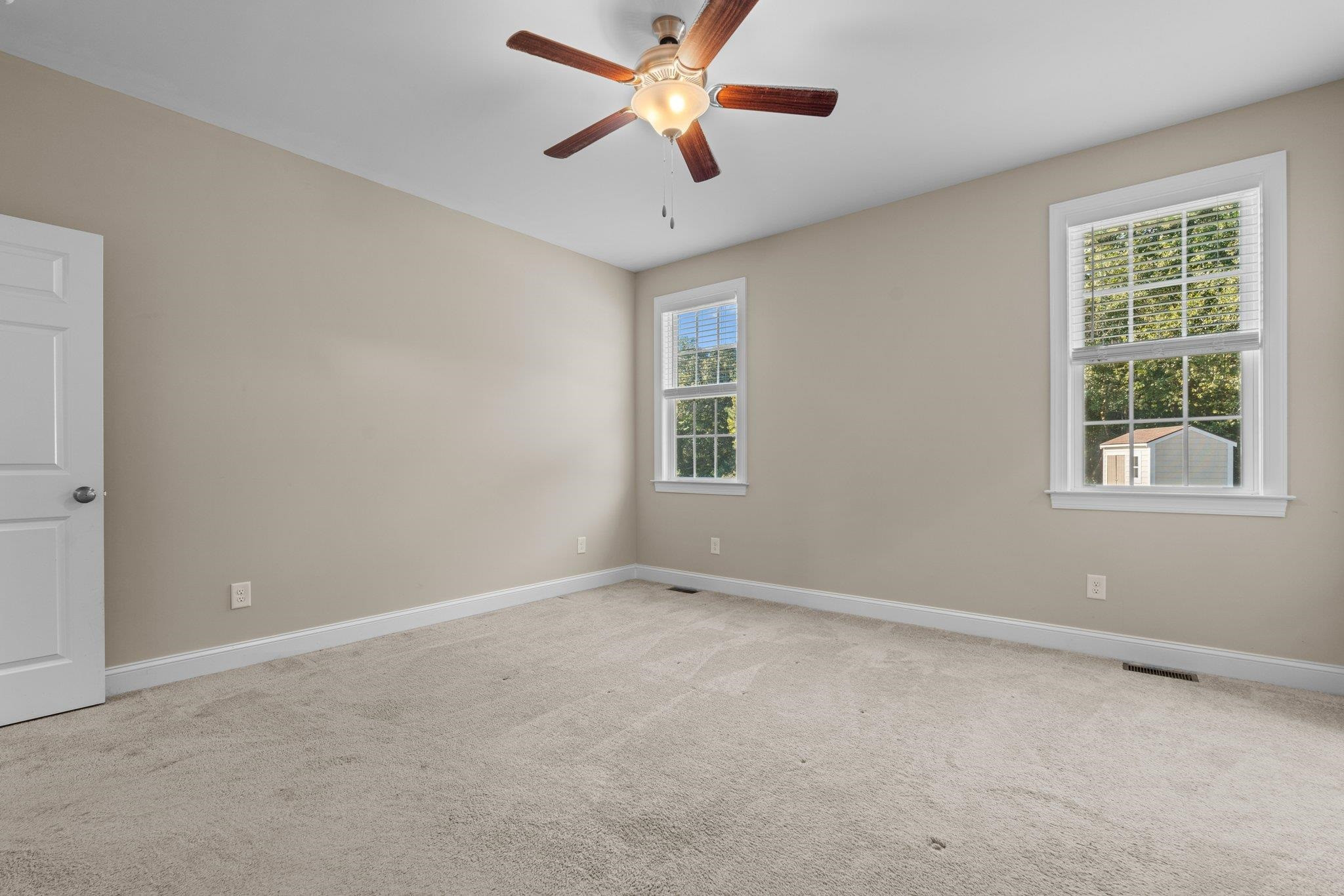 991 Sheriff Johnson Road Lillington, NC 27546 - Photo 34 of 52 a view of an empty room with a window