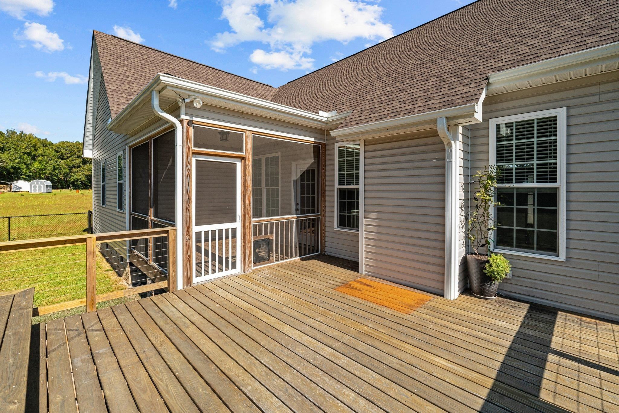 991 Sheriff Johnson Road Lillington, NC 27546 - Photo 43 of 52 a view of a house with a large window