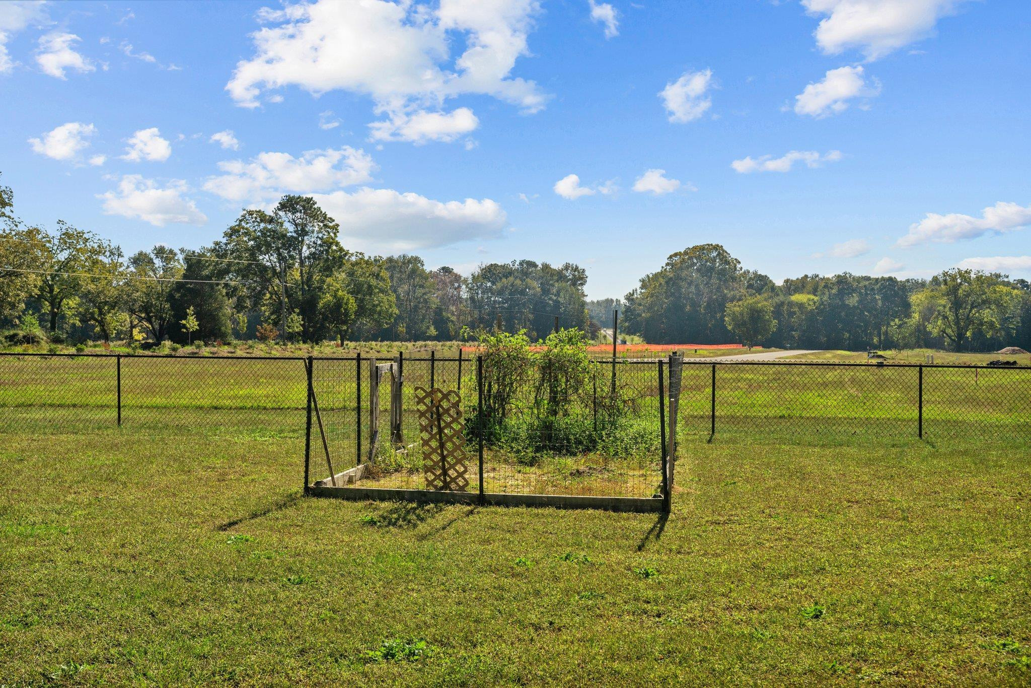 991 Sheriff Johnson Road Lillington, NC 27546 - Photo 48 of 52 a view of a lake with a big yard