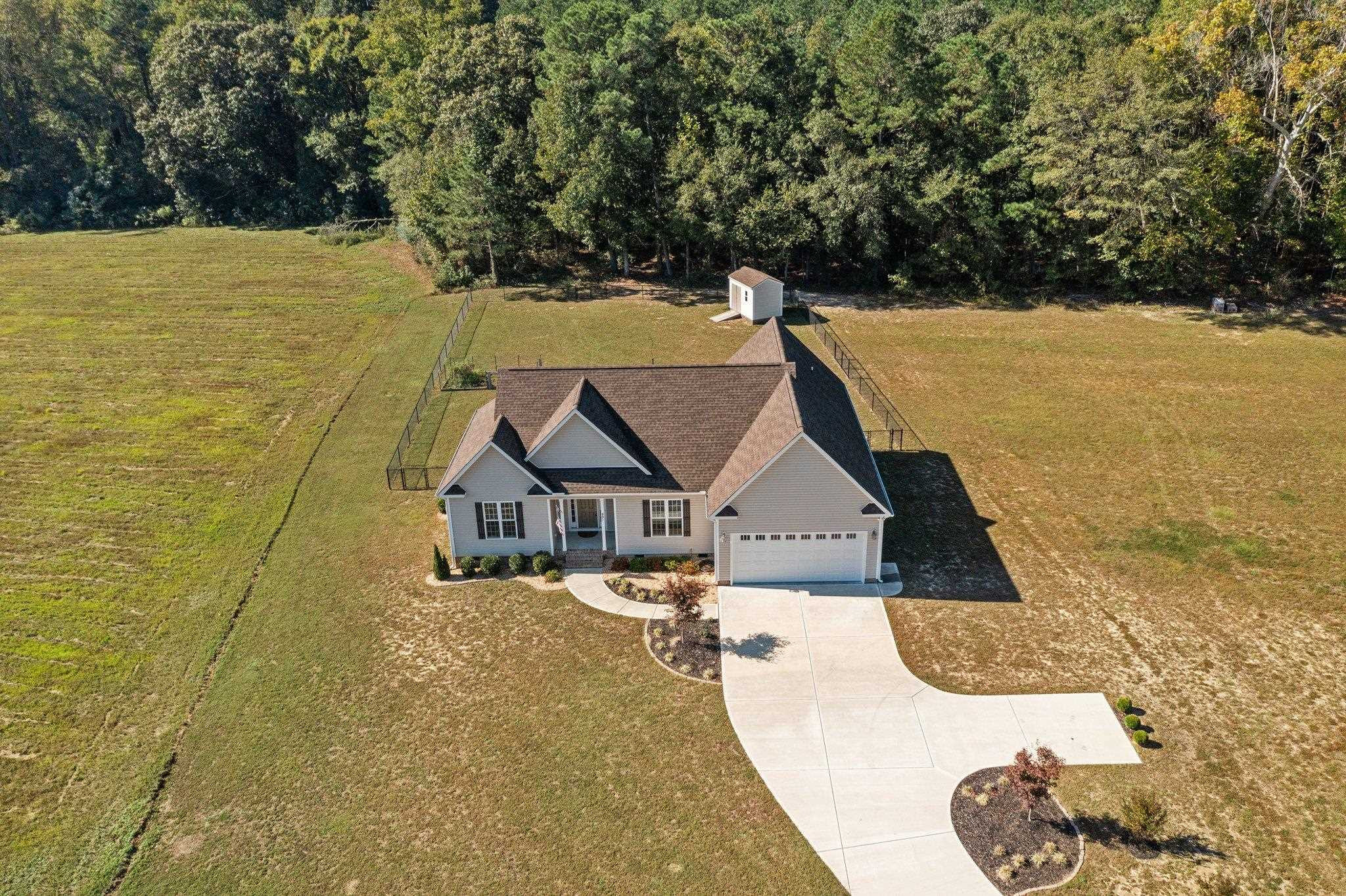 991 Sheriff Johnson Road Lillington, NC 27546 - Photo 5 of 52 a view of a house with a yard