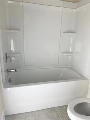 front view of a house with a street