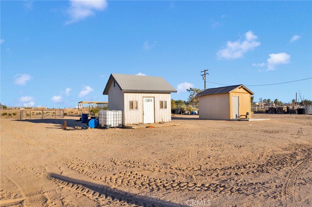32461 Prairie Avenue Barstow, CA 92311 - Photo 33 of 46 a view of a house with outdoor space and sitting area