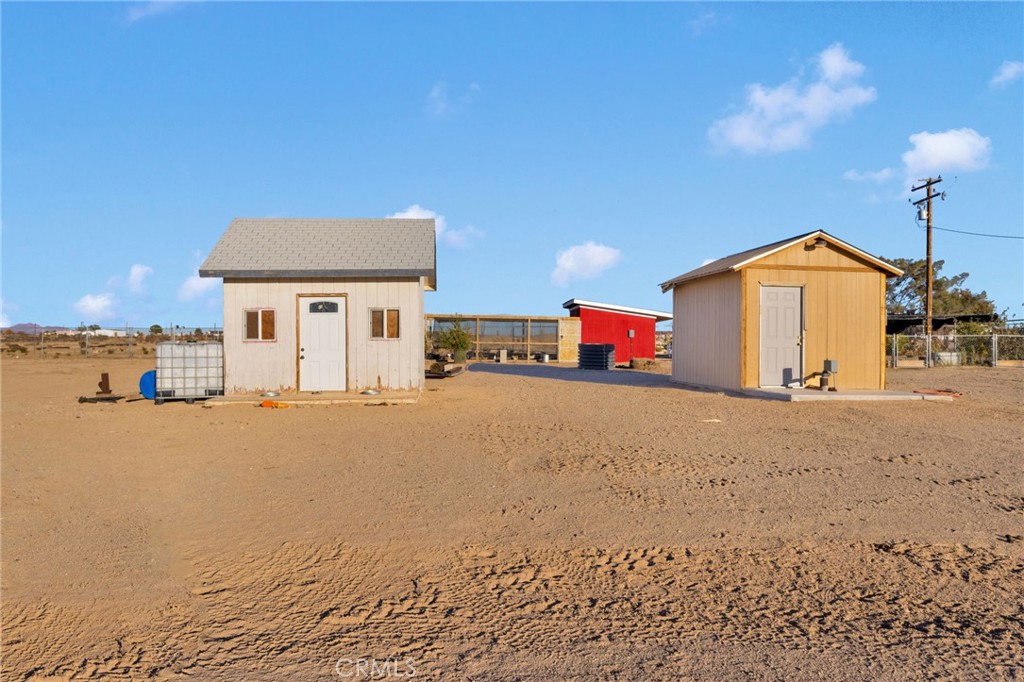 32461 Prairie Avenue Barstow, CA 92311 - Photo 34 of 46 a front view of a house with a yard