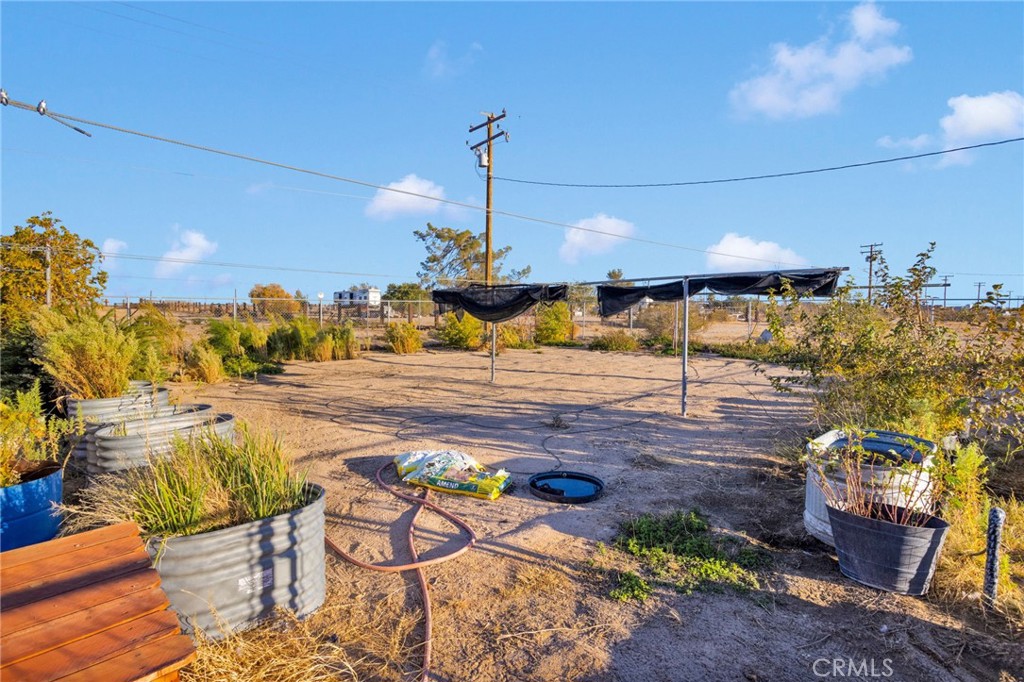 32461 Prairie Avenue Barstow, CA 92311 - Photo 37 of 46 a view of a swimming pool with a patio