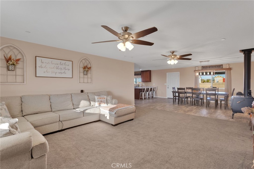 32461 Prairie Avenue Barstow, CA 92311 - Photo 7 of 46 a living room with furniture and kitchen view