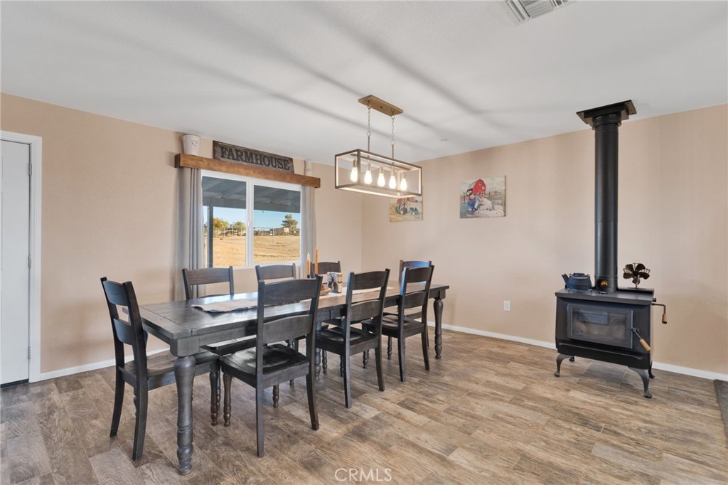 32461 Prairie Avenue Barstow, CA 92311 - Photo 9 of 46 a view of a dining room with furniture