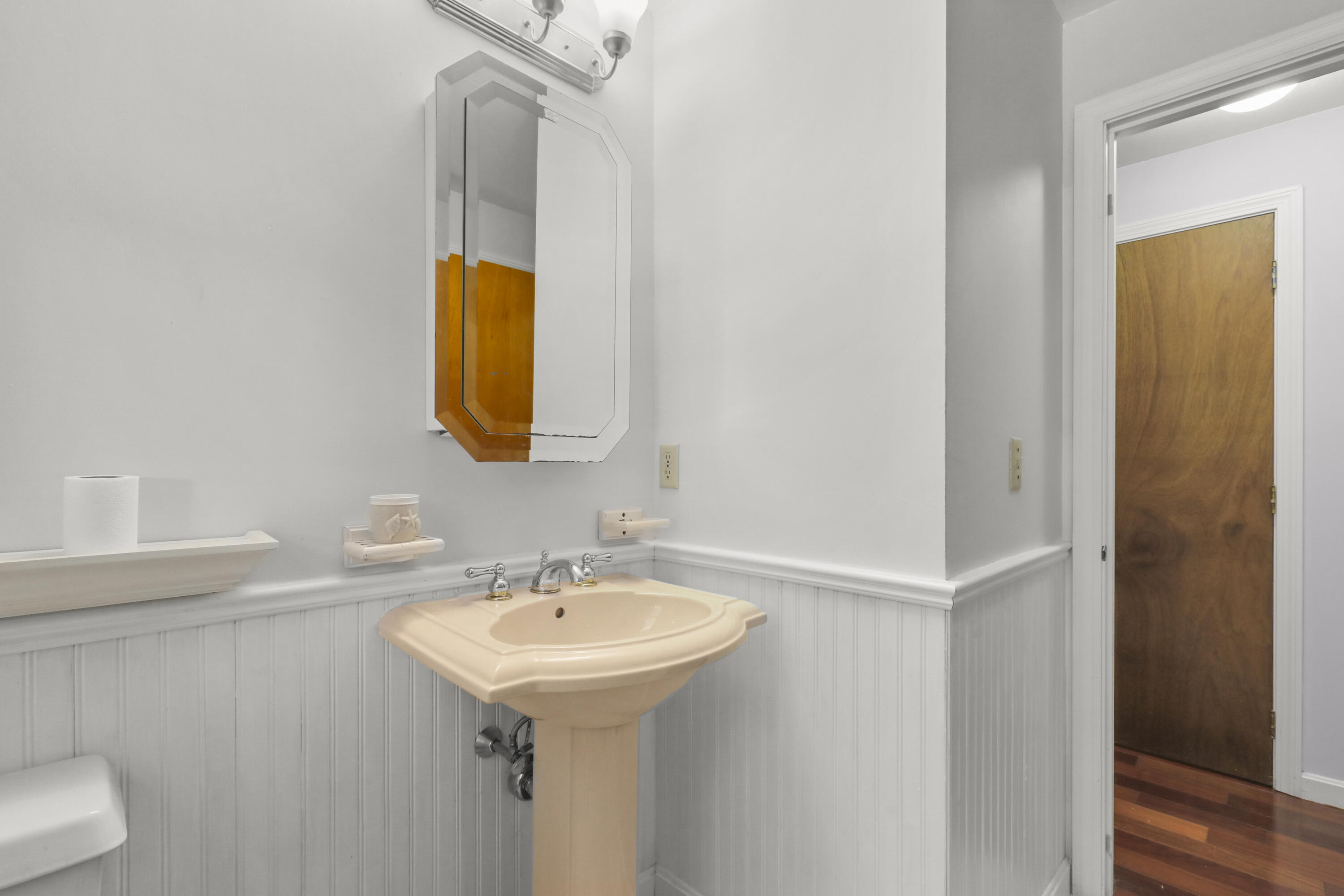 89 Degrass Road Mashpee, MA 02649 - Photo 16 of 37 a bathroom with a sink and a mirror