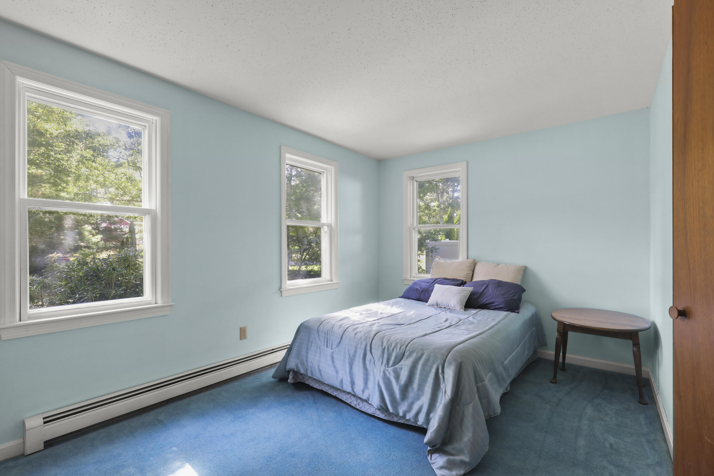 89 Degrass Road Mashpee, MA 02649 - Photo 20 of 37 a bedroom with a bed and window