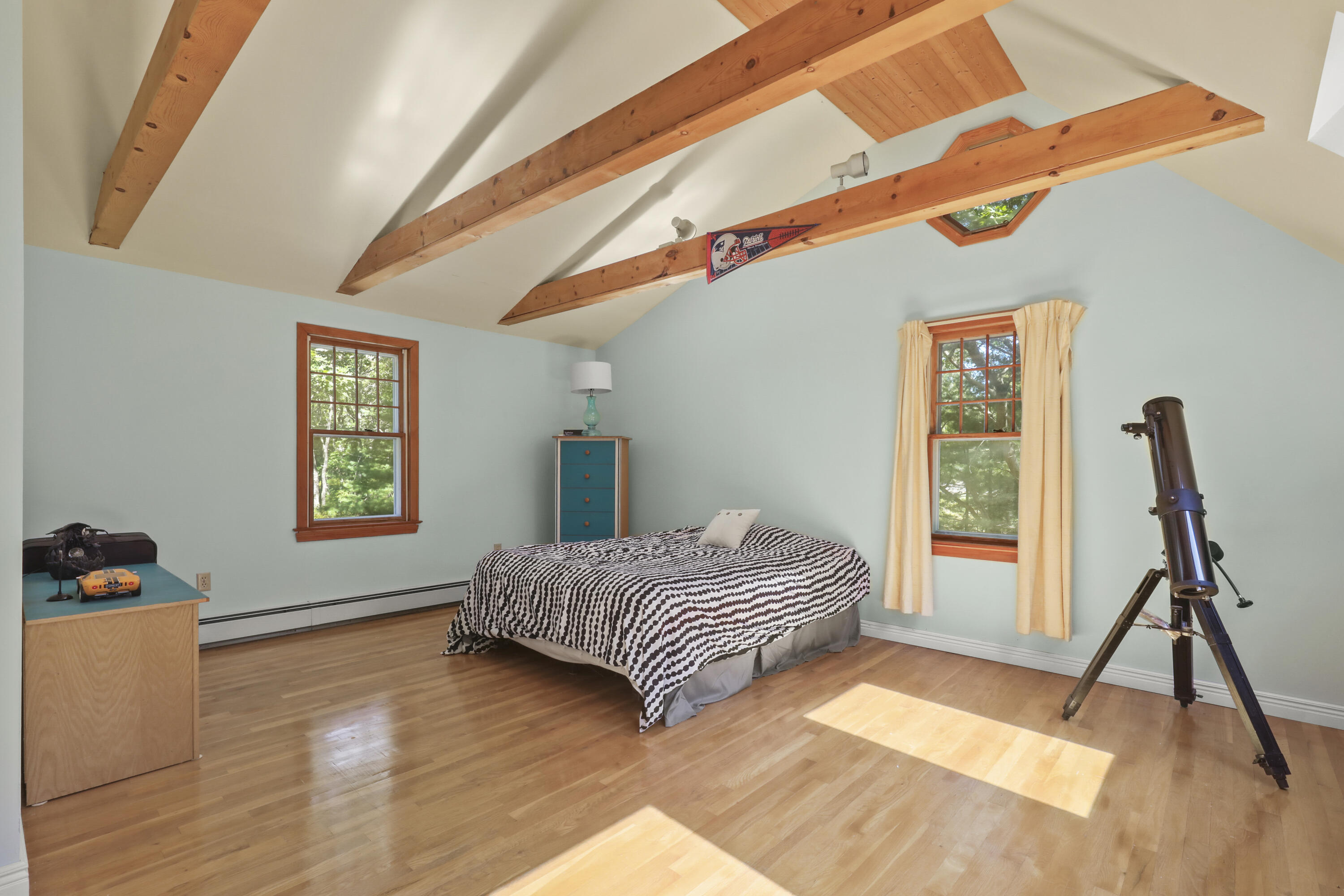 89 Degrass Road Mashpee, MA 02649 - Photo 27 of 37 a living room with a bed furniture and a window