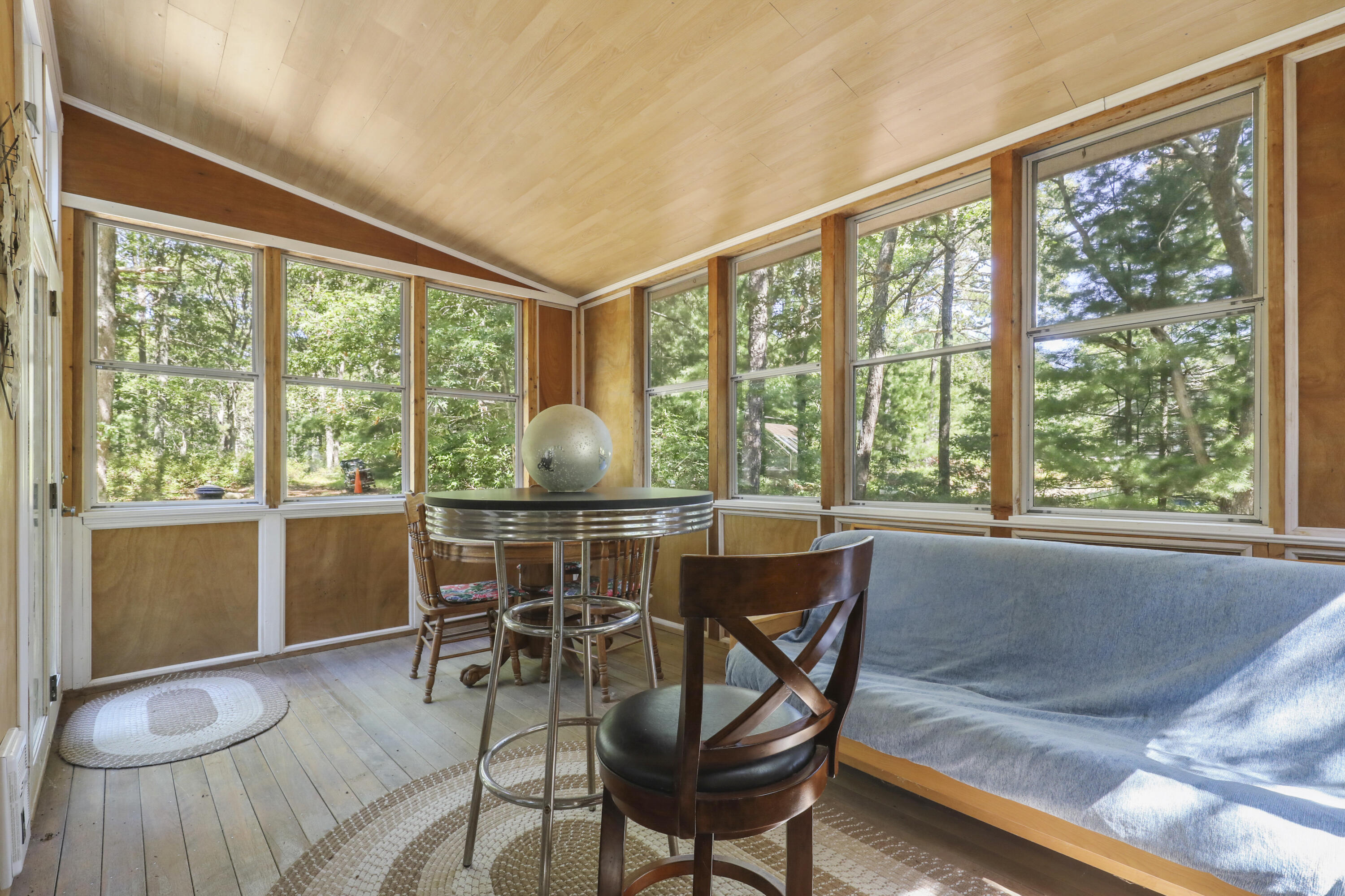 89 Degrass Road Mashpee, MA 02649 - Photo 32 of 37 a dining room with furniture and wooden floor