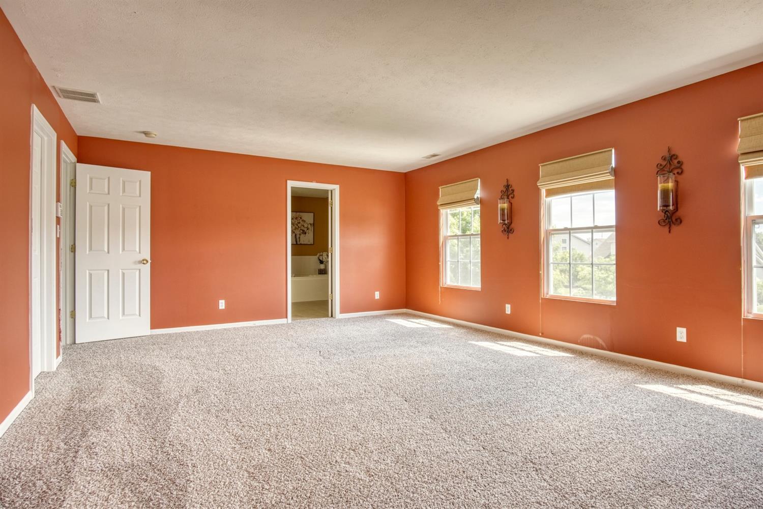 9512 Dewey Place Crown Point, IN 46307 - Photo 11 of 27 a view of an empty room with a window