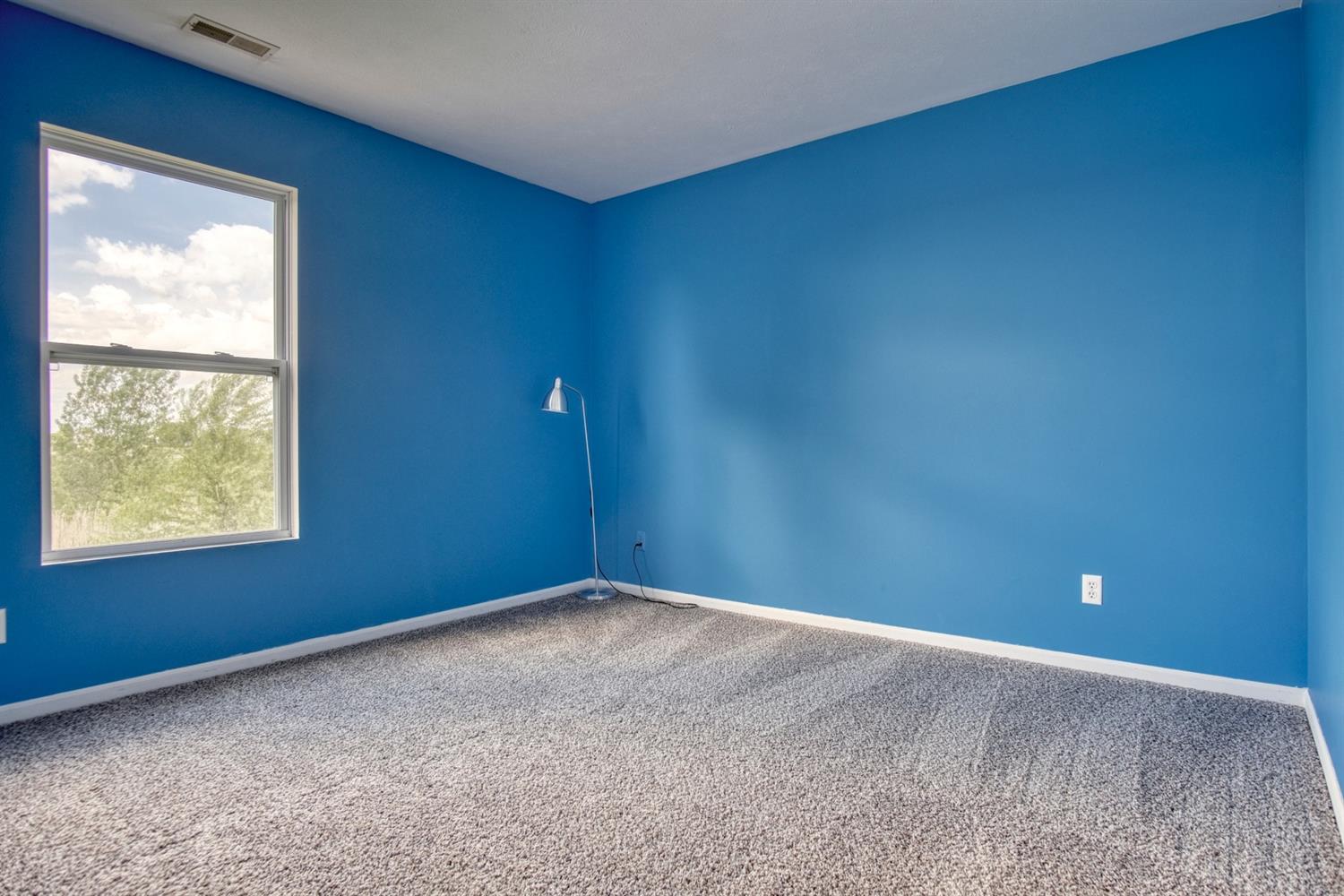 9512 Dewey Place Crown Point, IN 46307 - Photo 14 of 27 an empty room with windows