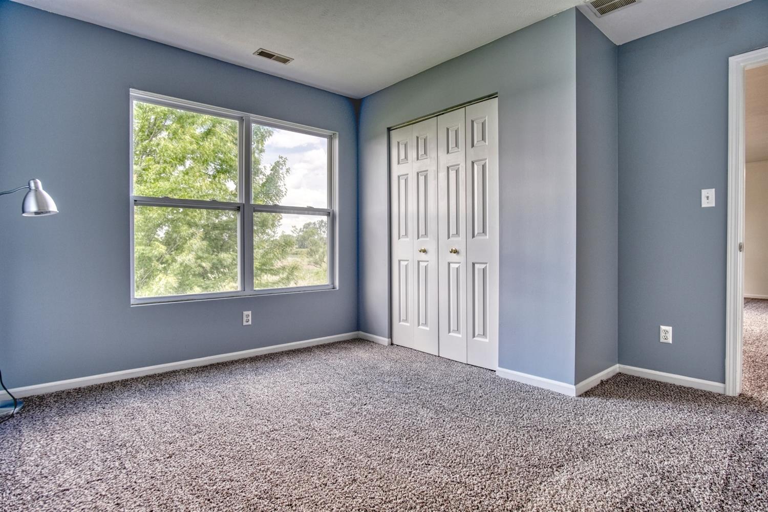 9512 Dewey Place Crown Point, IN 46307 - Photo 17 of 27 a view of empty room with window