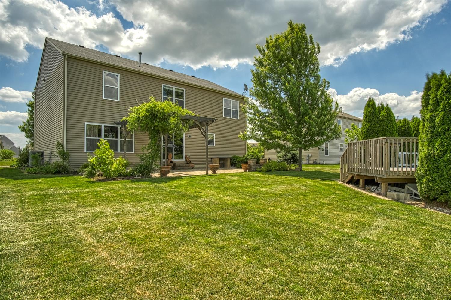 9512 Dewey Place Crown Point, IN 46307 - Photo 22 of 27 a view of a house with a backyard