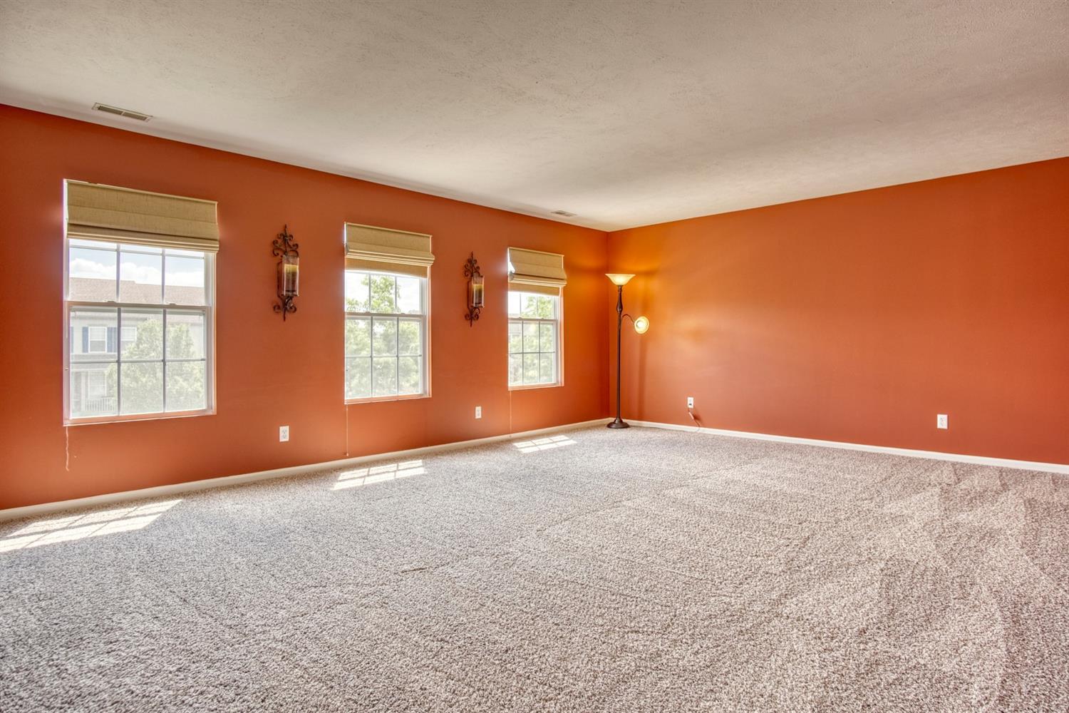 9512 Dewey Place Crown Point, IN 46307 - Photo 10 of 27 a view of an empty room with windows
