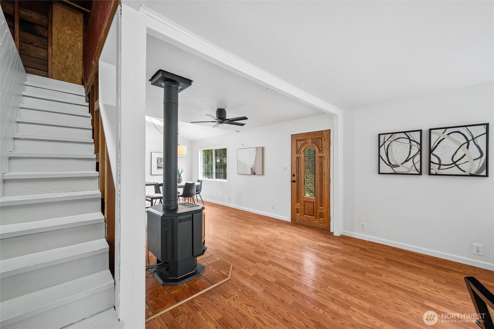 1264 Birch Bay Lynden Road Lynden, WA 98264 - Photo 11 of 38 a view of a hallway with wooden floor and staircase