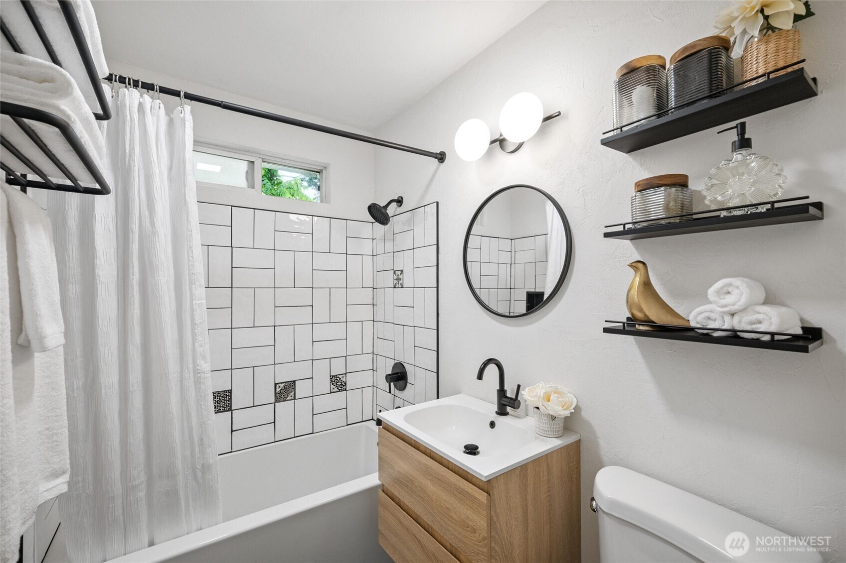 1264 Birch Bay Lynden Road Lynden, WA 98264 - Photo 20 of 38 a bathroom with a sink a toilet and a mirror