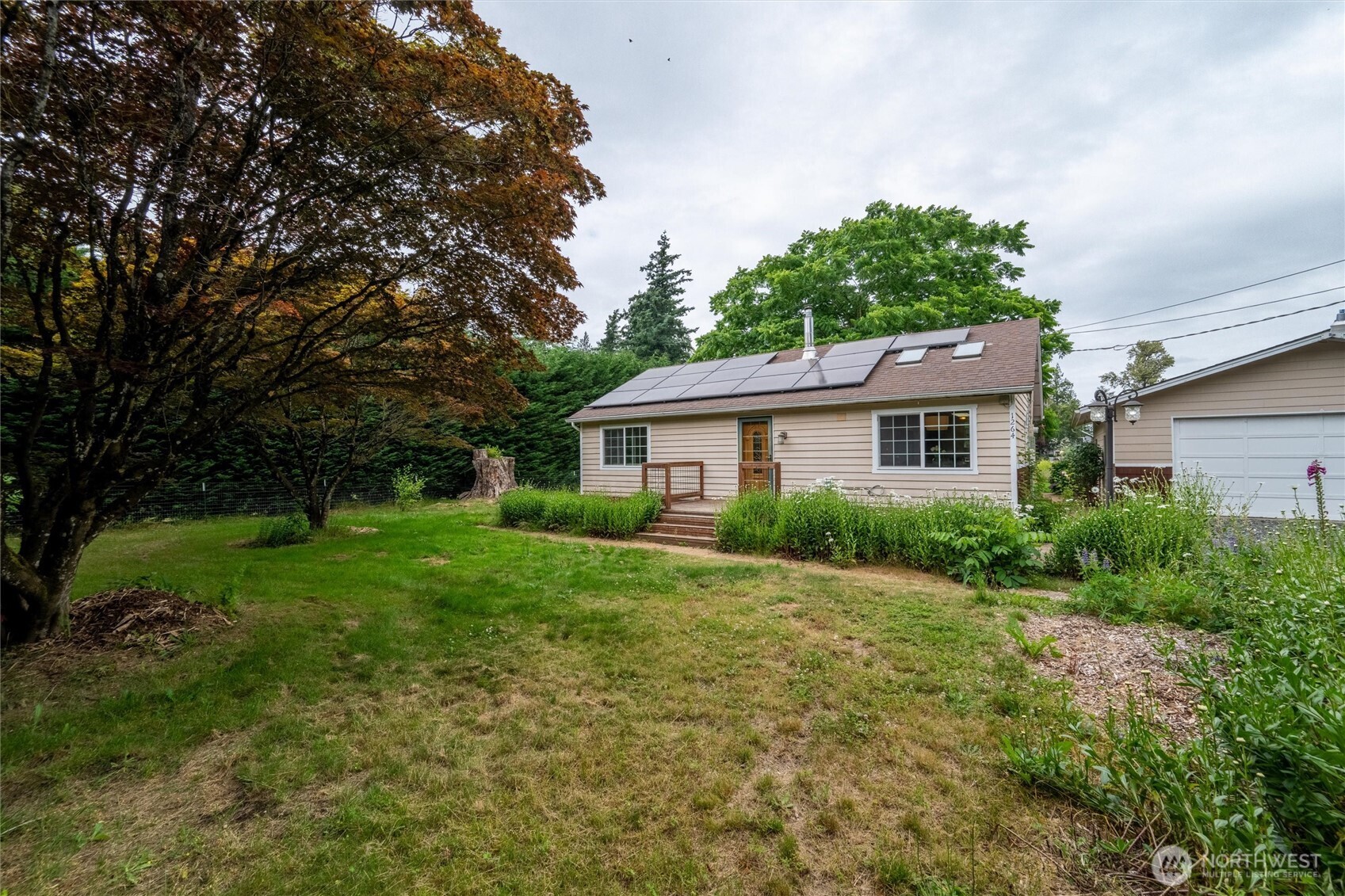 1264 Birch Bay Lynden Road Lynden, WA 98264 - Photo 2 of 38 a view of an house with backyard space and garden