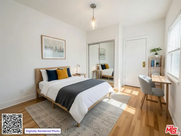 a spacious bedroom with a bed and a table