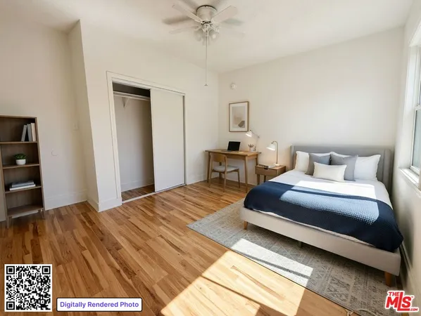 a bedroom with a bed and a table