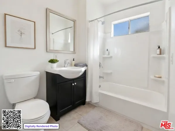 a bathroom with a toilet a sink and bathtub