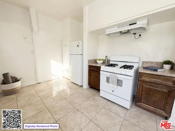 a kitchen with a stove and a cabinet