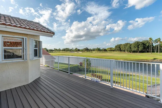 a view of balcony with outdoor space and wooden floor