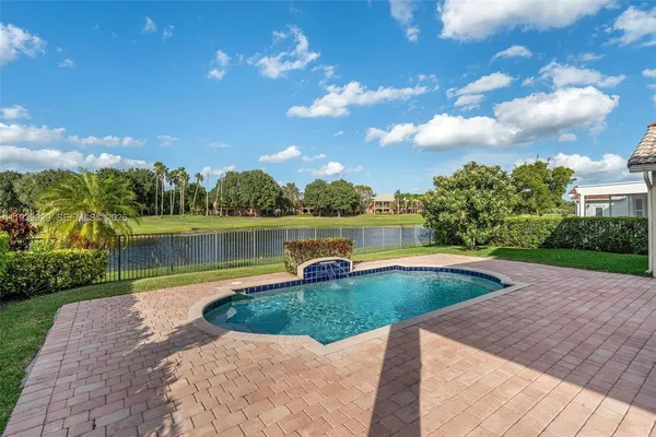 a view of a lake with a garden