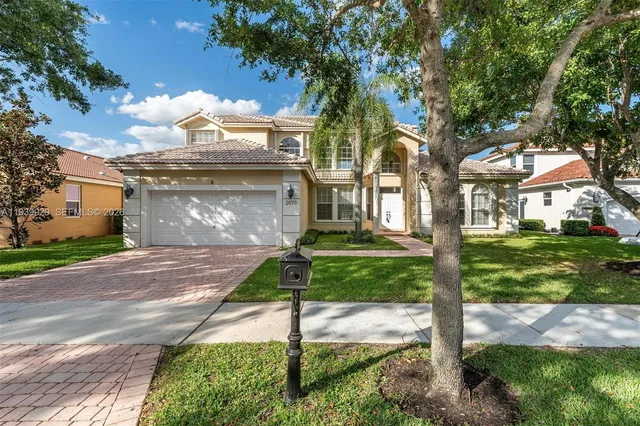a bathroom with a sink vanity and a mirror