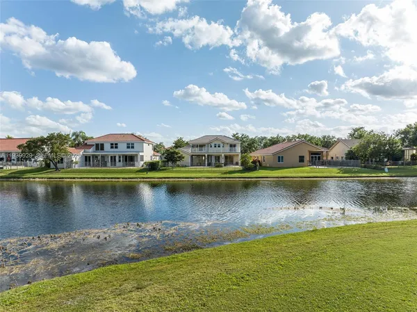 a view of a yard with an outdoor seating