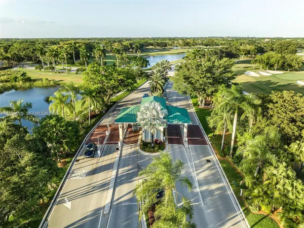 a view of a swimming pool and an outdoor seating