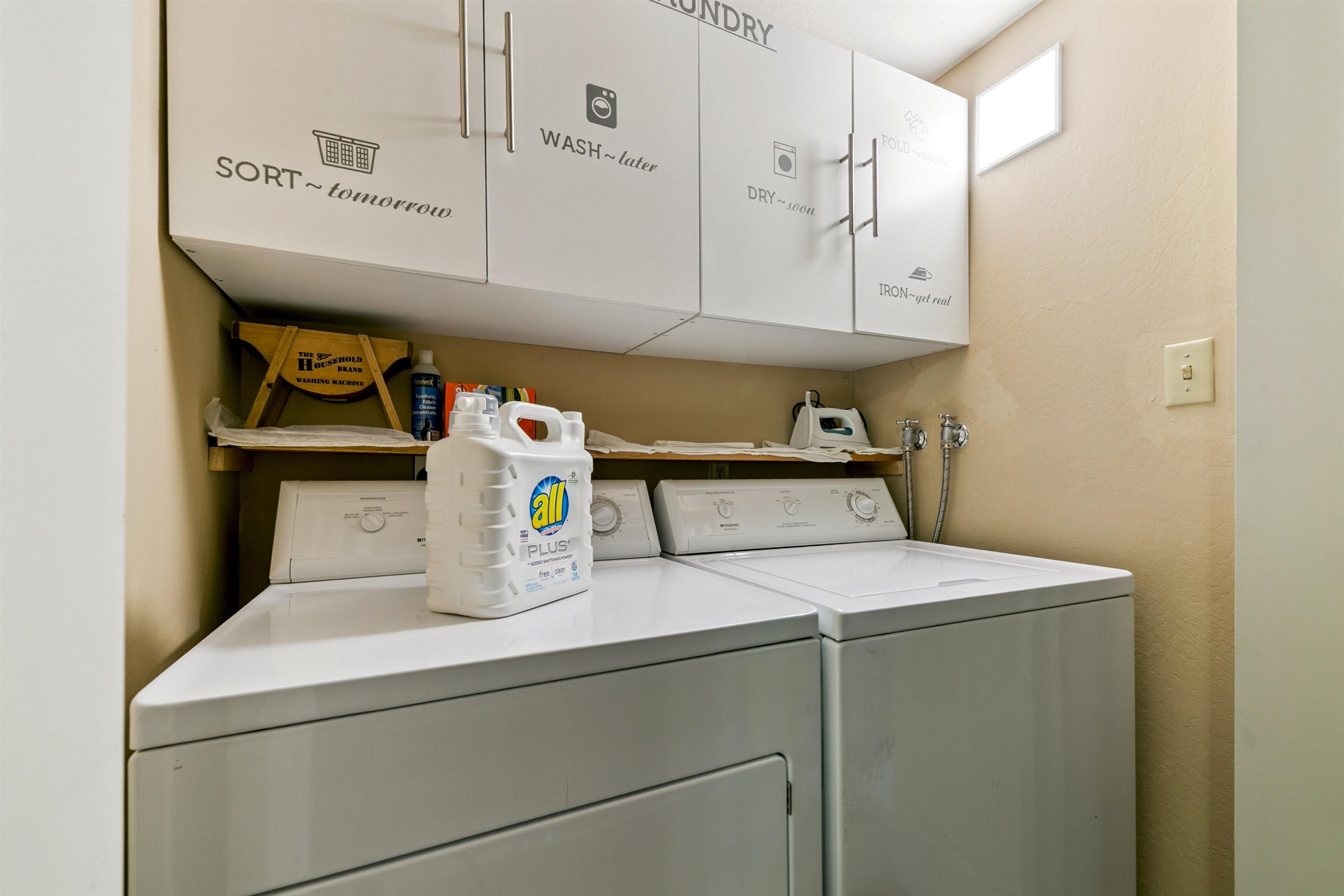 1001 Commonwealth Drive, Unit 106 Kings Beach, CA 96143 - Photo 20 of 27 a utility room with dryer and washer