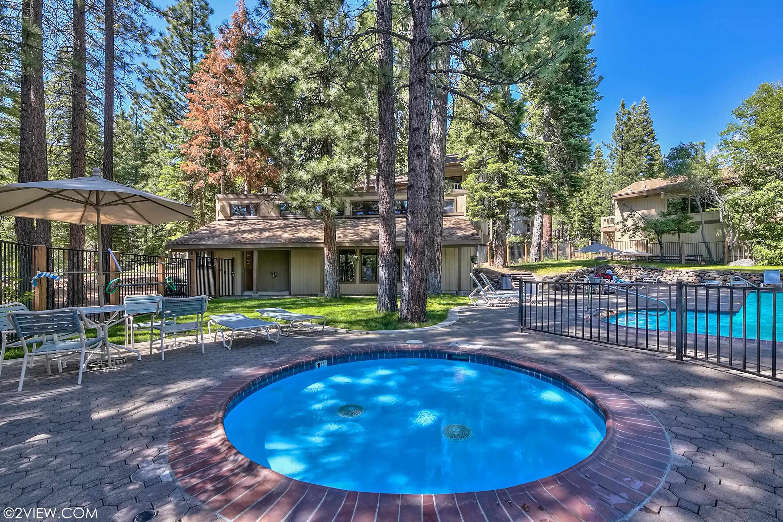 1001 Commonwealth Drive, Unit 106 Kings Beach, CA 96143 - Photo 23 of 27 a view of a swimming pool with a patio